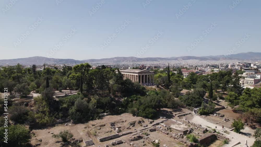Aerial circling view of Agoraios Kolonos and Temple of Hephaestus in ancient Agora of Athens, Greece Aerial circling view of Agoraios Kolonos and Temple of Hephaestus in ancient Agora of Athens, Greece