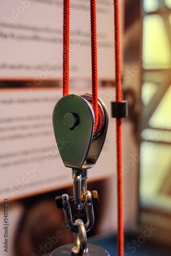 Movable Pulley is a mechanical that helps relieve force, facilitating the movement of objects. Soft and selective focus.