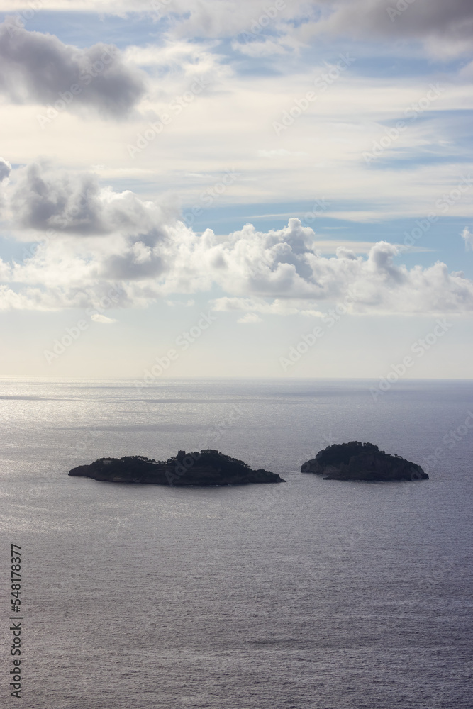Rocky Islands on Tyrrhenian Sea near Amalfi Coast, Italy. Sunny and Cloudy Day.