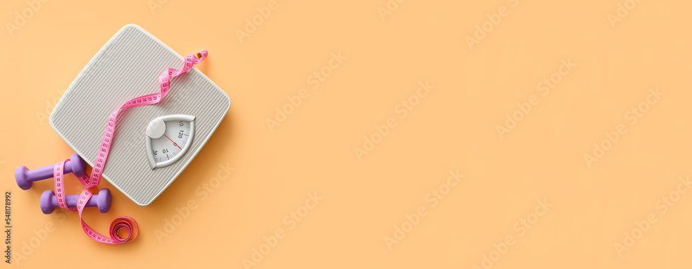 Scales, dumbbells and measuring tape on orange background with space for text. Diet concept - obrazy, fototapety, plakaty 