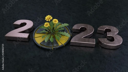 3d animation of the date of the 2023 new year and the destroyed radiation sign with a dandelion flower. On a metal background. The idea of the future, life broke through the metal and won. Ecology. photo