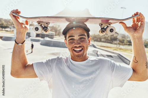 Portrait, skateboard and skater man in city, street or skate park ready for skating practice. Exercise, skateboarding sports and happy male preparing for fitness workout or training in town outdoors. photo