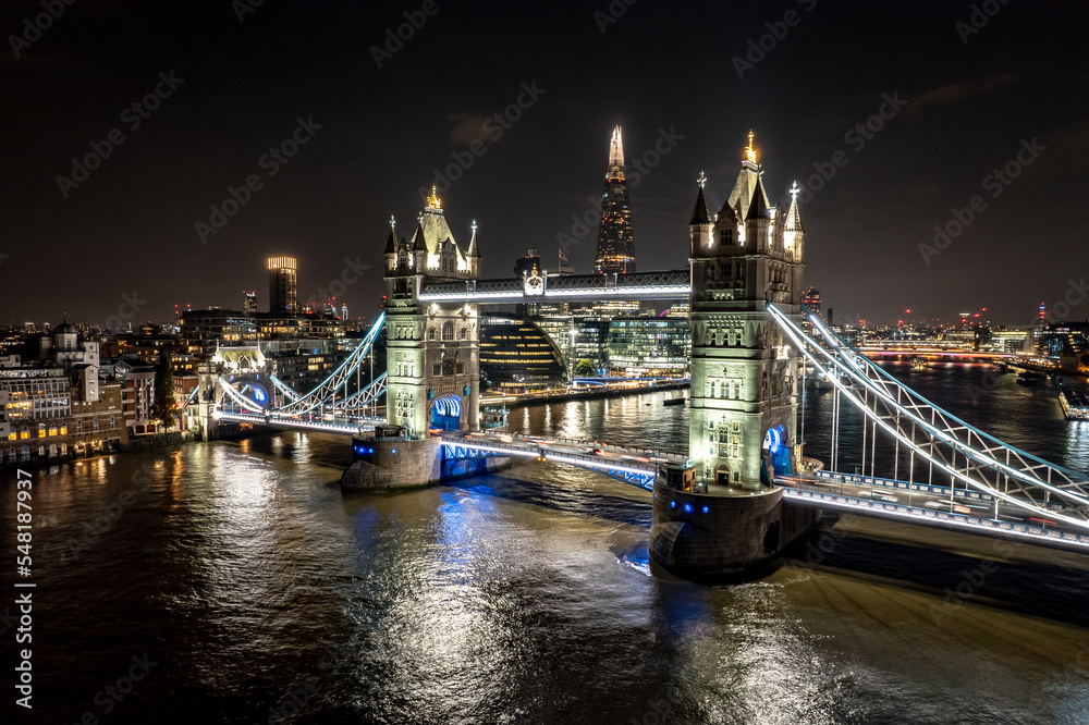 Iconic Tower Bridge London Illuminated at Night Aerial View