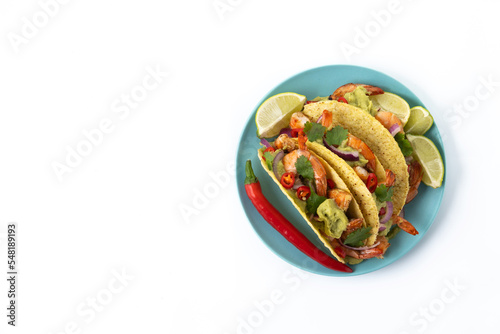 Mexican tacos with shrimp,guacamole and vegetables isolated on white background. Top view. Copy space