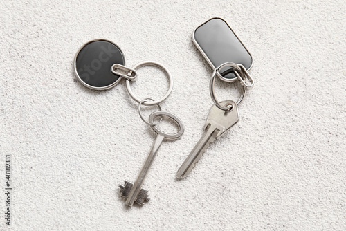 Keys with keychains on ligh...