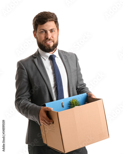 Fired young man holding box with personal stuff on white background © Pixel-Shot