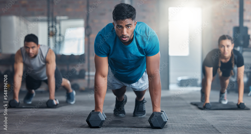 Group exercise in gym, people training body with focus mindset and sweat in  cross fit class together. Healthy lifestyle in fitness club, floor workout  with personal trainer and challenge energy Stock Photo