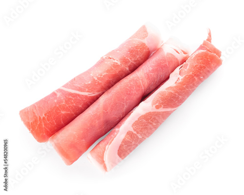 Rolled slices of tasty ham isolated on white background