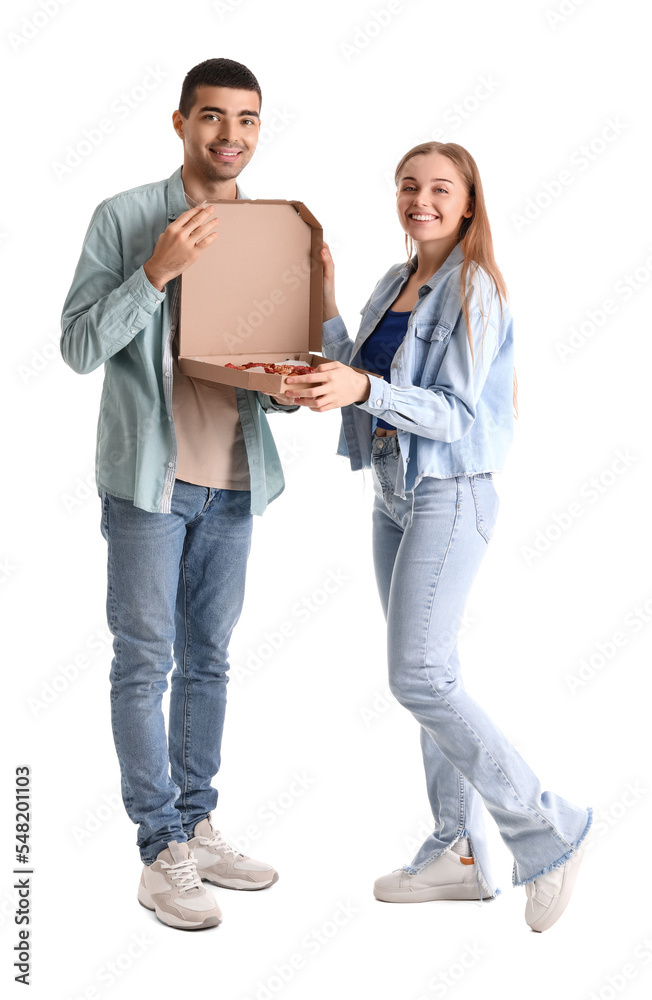 Fototapeta premium Happy young couple with fresh pizza on white background