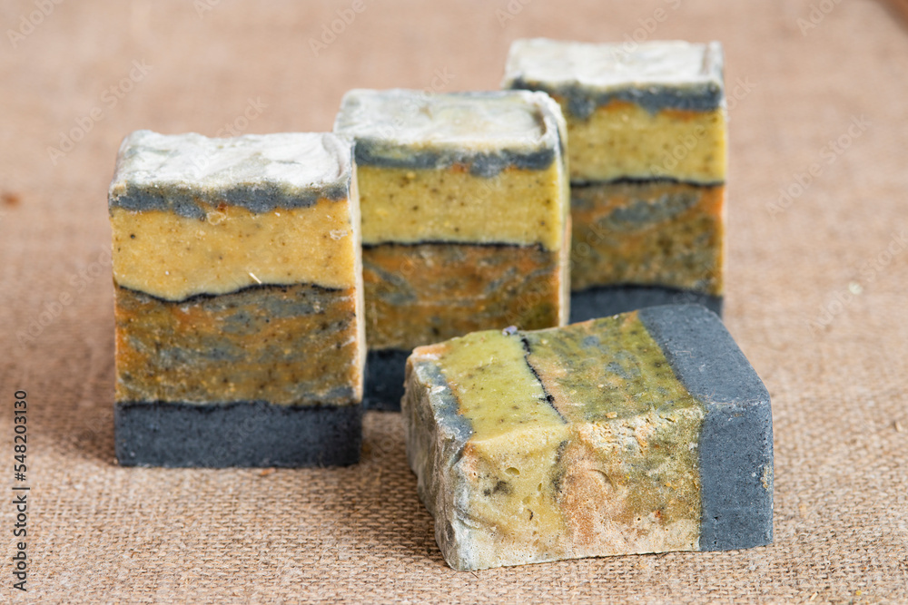 Handmade Soap closeup. Natural Soap making. Soap bars closeup. Spa treatments, skin care concept Handmade Soap closeup. Natural Soap making. Soap bars closeup. Spa treatments, skin care concept