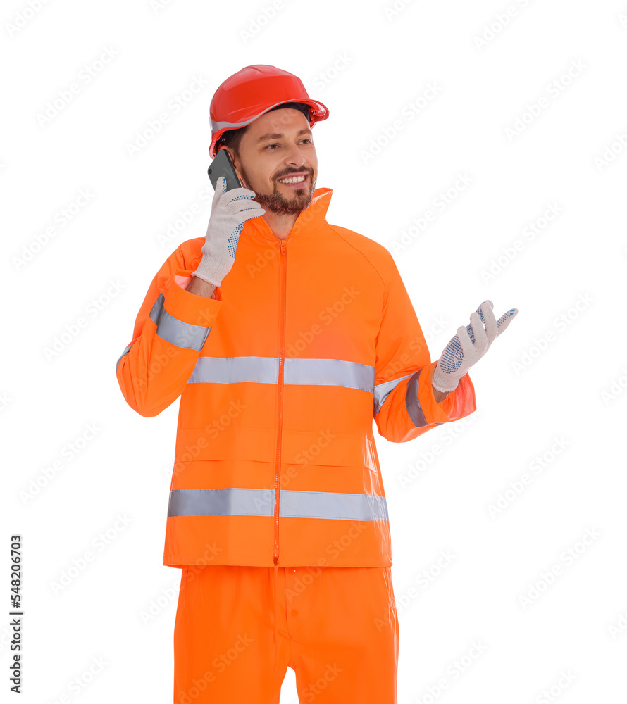 Man in reflective uniform talking on phone against white background Man in reflective uniform talking on phone against white background