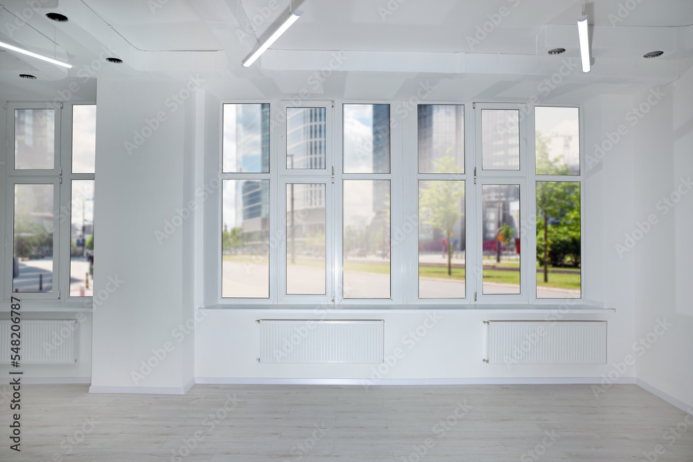 Fototapeta premium New empty room with clean windows and white wall