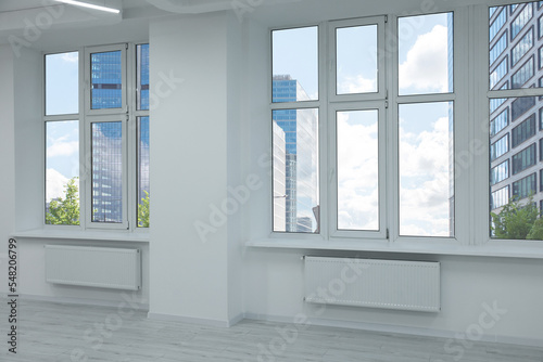 New empty room with clean windows and white wall © New Africa