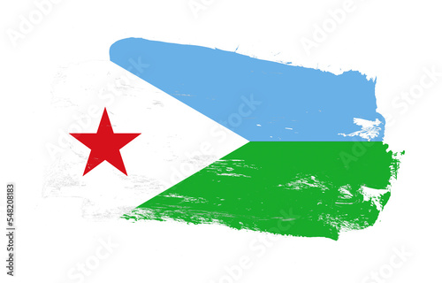 Stroke brush painted distressed flag of djibouti on white background photo