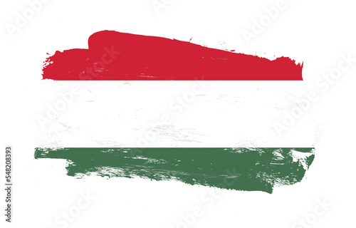 Stroke brush painted distressed flag of hungary on white background