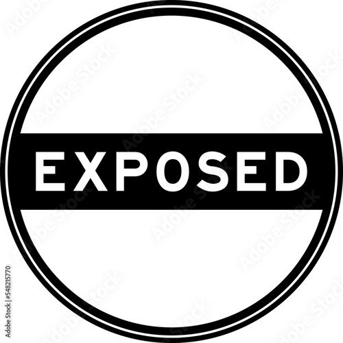 Black color round seal sticker in word exposed on white background
