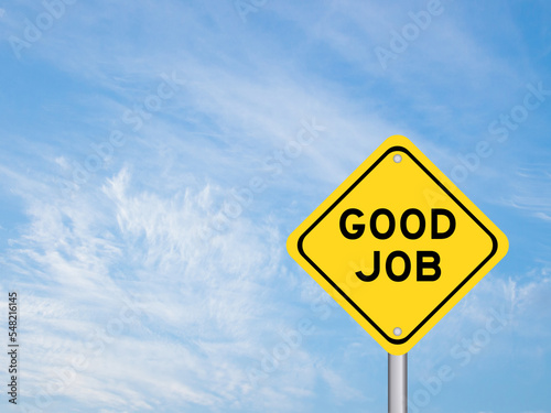 Yellow transportation sign with word good job on blue color sky background