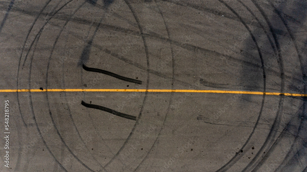 Top view tire tracks texture and background. Asphalt texture with line