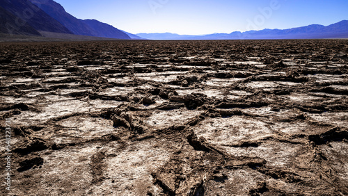 Salt Flats, abstract shapes of the cracked raised ground surface in Badwater Basin, Death Valley, California, the lowest and hottest point in North America at 282 feet below sea level 