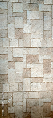 wall made of various square natural in beige, ocher and brown
