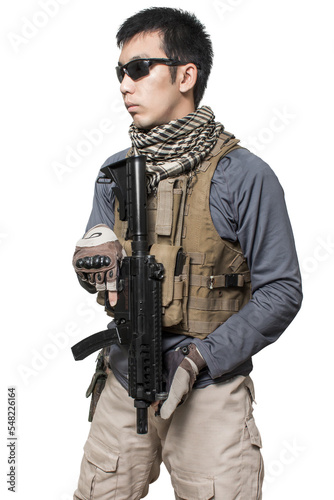 Private military contractor man with modern sub machine gun weapon isolated on white background