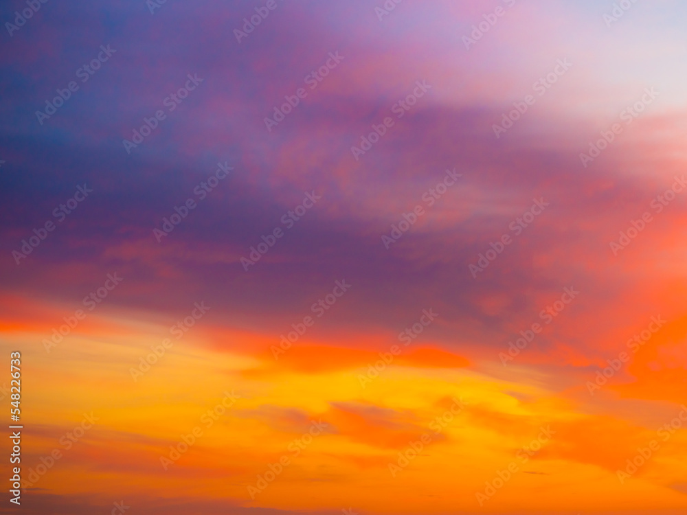 Beautiful sunset sky with amazing colorful clouds against deep blue Beautiful sunset sky with amazing colorful clouds against deep blue
