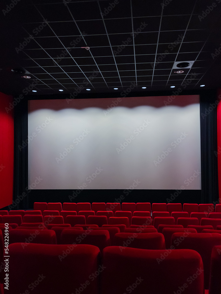 Fototapeta premium Cinema Screen And Red Seats. Empty Screening Theater