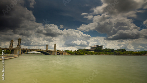 KL, MALAYSIA - Nov 18th, 2022 : image of Putrajaya International Convention Centre PICC Malaysia lake side view duuring sunset with marching clouds photo