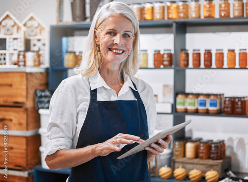 Success, tablet and woman manager of a small business, honey store or retail shop searching online. Smile, portrait and happy entrepreneur scrolling the internet for digital marketing advice or tips