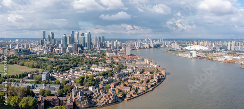 Commercial and residential buildings and skyscrapers of the London metropolis, aerial view. City and people globalization concept. © 24K-Production