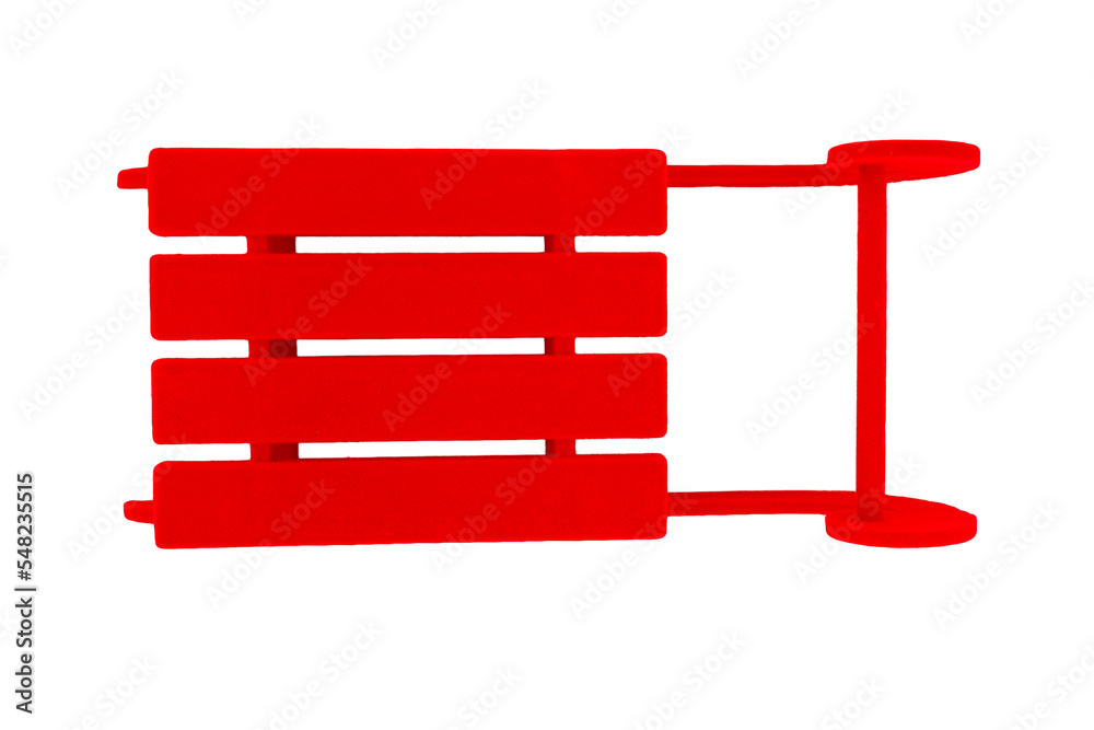 Christmas sleigh decoration with red velvet top view isolated on