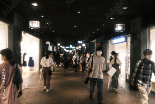 people walking in subway station