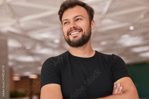 Positive male worker in workplace