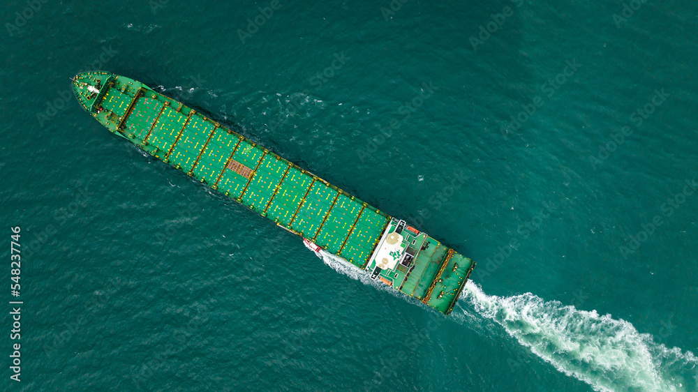 cargo ship test engine system after being repaired. photograph from drone camera aerial top view cargo ship test engine system after being repaired. photograph from drone camera aerial top view