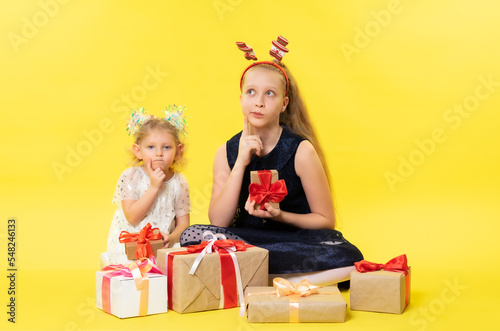 Girl with gifts. Christmas. Studio