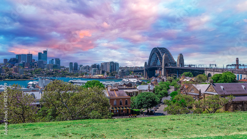 Sydney Harbour viewed from Observatory Park and overlooking Sydney Rocks area and North Sydney with colourful skies NSW Australia photo