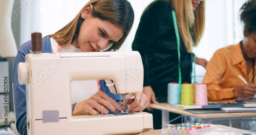 A group of young women are learning the profession of design and tailoring.
