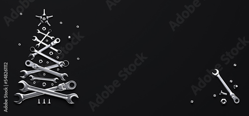 A symbolic Christmas tree made of wrenches, bolts and nuts on a dark background. Creative template of a New Year greeting for construction and engineering companies.