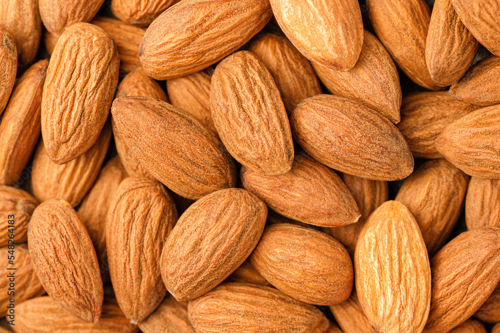 background of peeled raw almonds background of peeled raw almonds