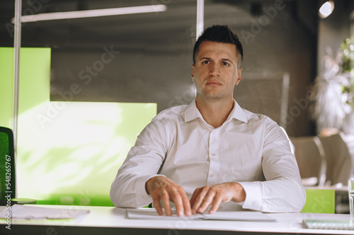 Obraz na plátne Visually impaired office worker reading by touch