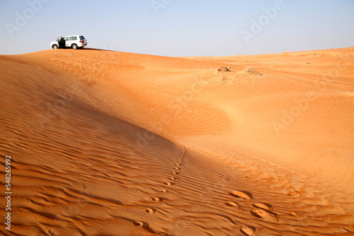 Off road vehicle on sand dunes  Oman