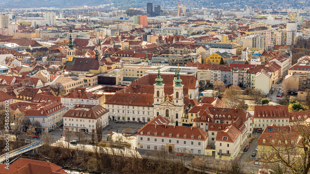 View of the Church of Mariahilf, Merciful Church of the Annunciation and surrounding city. Graz, Austria.
