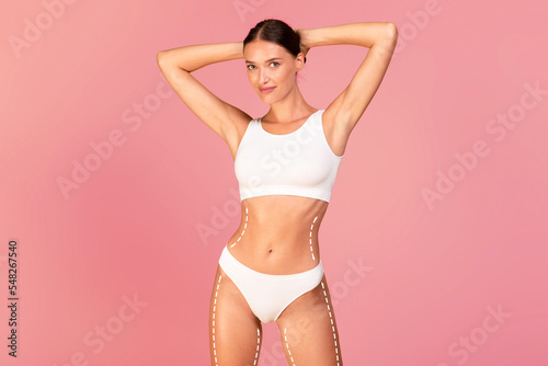 Young Beautiful Lady In Underwear With Dashed Lines On Her Body