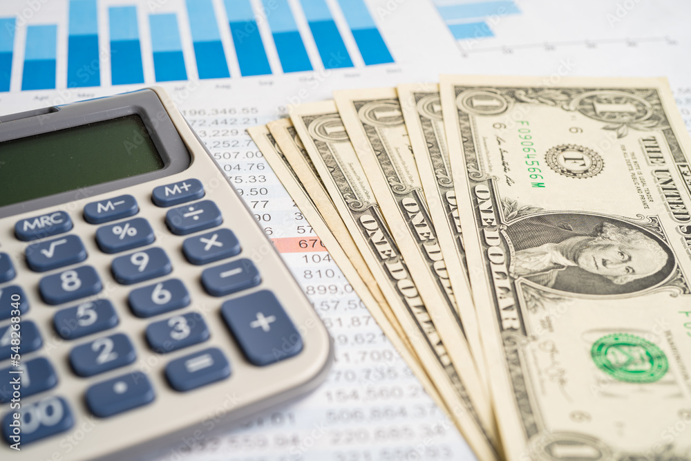 Calculator on graph paper. Finance development, Banking Account, Statistics, Investment Analytic research data economy, Stock exchange trading, Business company concept. Calculator on graph paper. Finance development, Banking Account, Statistics, Investment Analytic research data economy, Stock exchange trading, Business company concept.