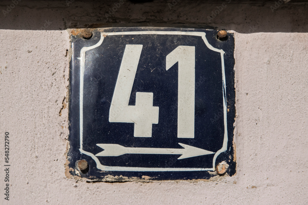 Weathered grunge square metal enameled plate of number of street address with number 41 Weathered grunge square metal enameled plate of number of street address with number 41