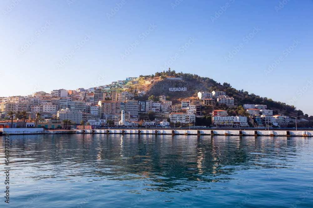 Homes and Buildings in a Touristic Town by the Aegean Sea. Kusadasi, Turkey. Sunny Morning Sunrise.