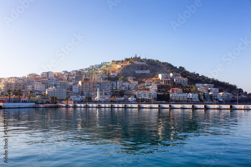 Homes and Buildings in a Touristic Town by the Aegean Sea. Kusadasi, Turkey. Sunny Morning Sunrise.