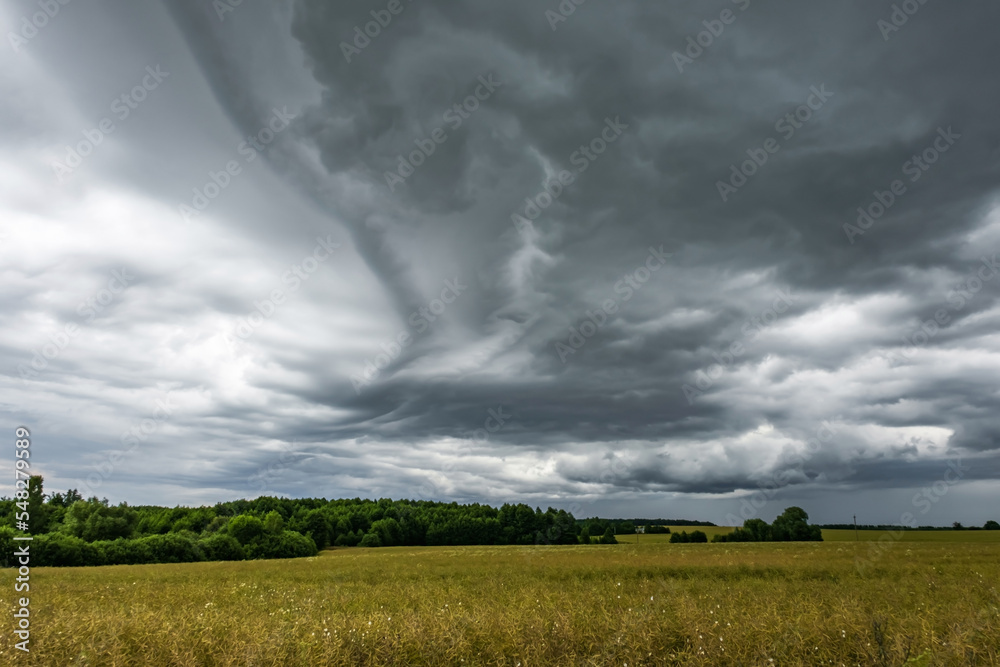 panorama of black sky background with storm clouds. thunder front panorama of black sky background with storm clouds. thunder front