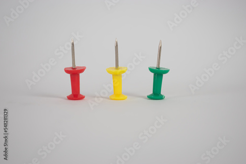 Thumbtack pushpin close up white background 