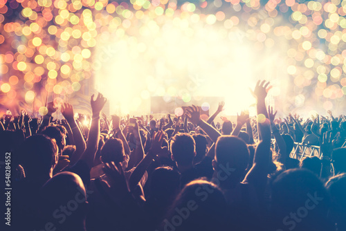 Fotografia Crowd at concert and blurred stage lights.